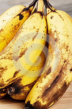 Close up of Over Ripe Bananas isolated of a wooden