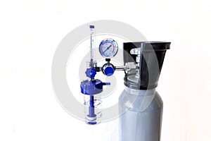 Close-up of oxygen flowmeter and tank for first aid photo