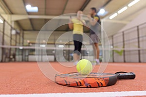 close up padel racket and net photo