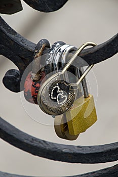 Close Up of Padlocks on Black Metal Fence