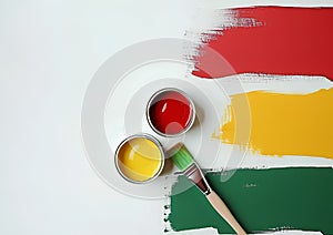 Close-up of paintbrushes and paint cans