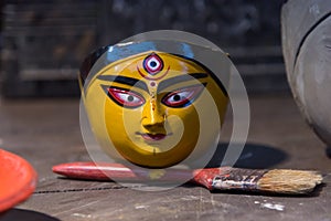 Close up of painted idol of Goddess Durga