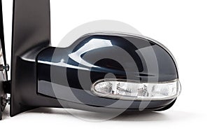 Close-up on a pair of side mirrors from a minibus with turn signal repeaters for repair and replacement after an accident in a