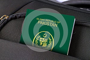 Close up of Pakistan Passport in Black Suitcase Pocket