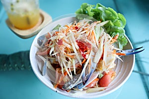 Close up Papaya Salad with Blue Crab on the table.