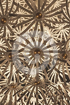 Close up, paper petals of lightshade. Abstract.