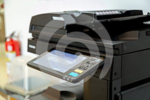 Close up paper sheets on the printer in office room