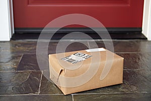 Close Up Of Parcel Delivery Outside Front Door