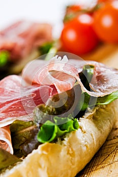 Close up of a parma ham sandwich