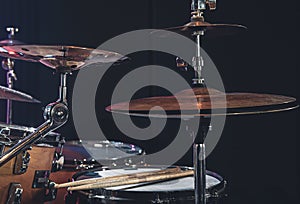 Close-up, part of a drum kit on a blurred background.