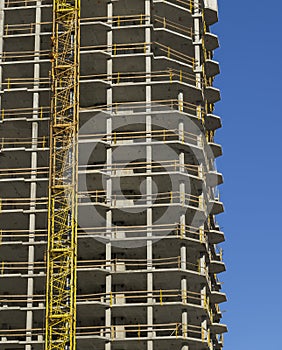 close-up of a part of a multi-storey residential building made of concrete and metal