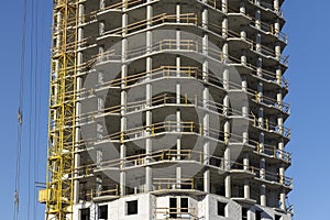 close-up of a part of a multi-storey residential building made of concrete and metal