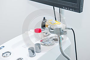 Close up part of Professional EVO ENT Medical Devices Workstation. Ear Nose and Throat Medical equipment. Washing syringe. Selecti photo