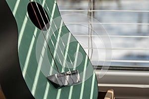 Close up of a part of ukelele guitar