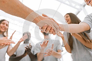 close up.the participants of the briefing, shaking hands with e