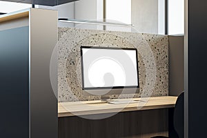 Close up of partitioned wooden and marble workplace with empty white computer screen and mock up place.