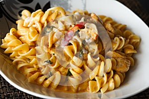 Fusilli with green curry sauce photo