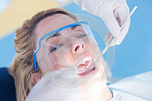 Close up of a patient with mouth open under the light