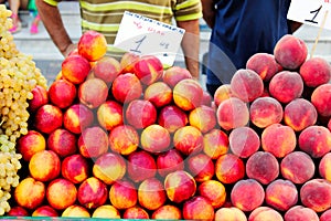 Close up of peaches at street market