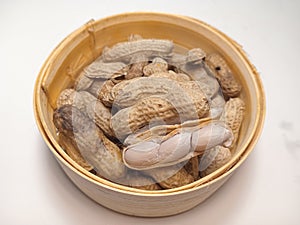 close up of peanuts with shells opened
