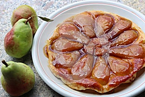 Close up of  pears tarte tatin with caramelised sugar