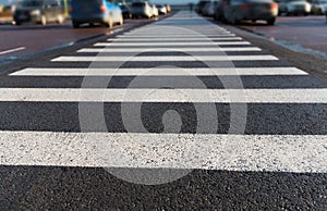 Close up of pedestrian crosswalk on city parking