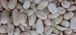 close-up of peeled, skinless peanuts