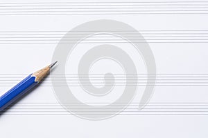 Close up of pencil on music sheet on the table