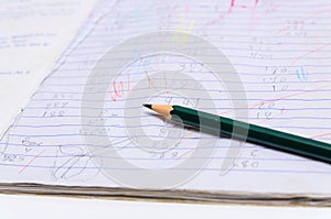 Close up pencil and paper noot book