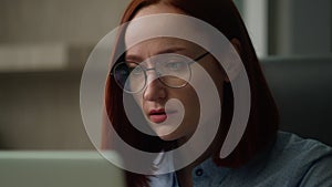 Close up pensive female entrepreneur thinking looking at laptop screen Caucasian business woman read news email in