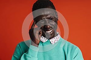 Close up of a pensive worried african man isolated
