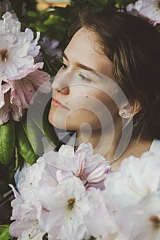 A close up of a person holding a flower