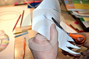 Close up of a person holding a piece of paper