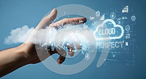 Human hand interacting with glowing digital cloud interface symbolizing cloud computing and data connectivity