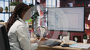 Close up of person using coding application to write and test code