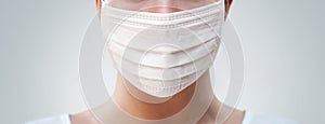 Close up of a person wearing protective mask