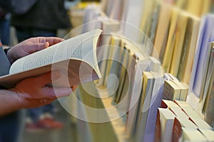 Close up perspective view of book rows in book fair selective focus