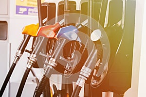Close up of petroleum gasoline station service - oil refueling and refilling for car transportation concept.