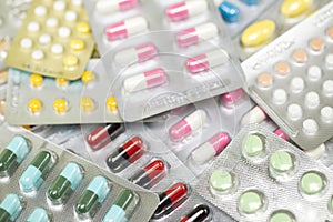 Close up pharmaceuticals antibiotics pills medicine in blister packs. photo