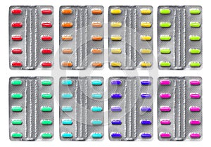 close up pharmaceuticals antibiotics pills medicine in blister packs. colorful antibacterials pills Pharmacy background. capsule