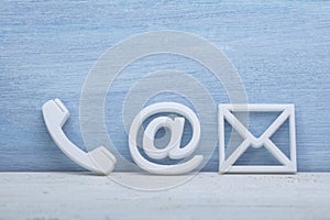 Close-up Of A Phone, Email and Post Icons