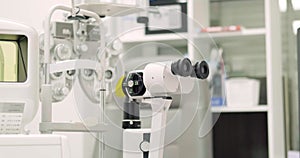 close up of phoropter, specialized instrument used in eye examinations to measure refractive errors and determine