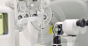 close up of phoropter, specialized instrument used in eye examinations to measure refractive errors and determine