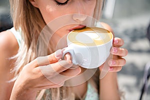 Close up photo of adorable lovely pretty cute woman sipping coffee on sunny spring warm day enjoying weekend time
