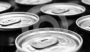 Close up photo of aluminium cans in a raw. Aluminium can background. Can Pattern. Aluminium beverage cans. Drink can. Metal contai