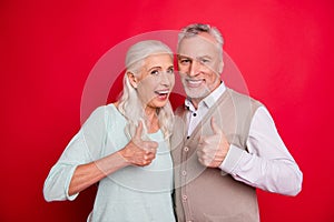 Close up photo amazing funny she her he him his old guy lady hugging best partners thumbs up symbol amazed advising buy