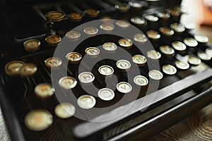 Close up photo of antique typewriter keys, shallow focus