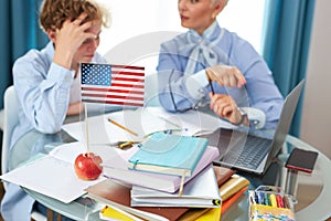 Close-up photo of apple and usa flag on table