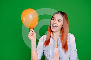 Close up photo beautiful amazing funky she her foxy lady hold look air balloon arm hand excited cheerful positive