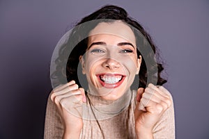 Close up photo beautiful amazing she her overjoyed lady girlish toothy smile hands arms fists raised air best win